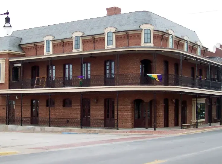 Old red brick commercial building with a new roof